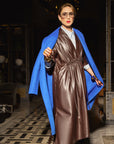 Carla modeling the coat in Cobalt with the everywhere everyday dress in Chocolate brown.