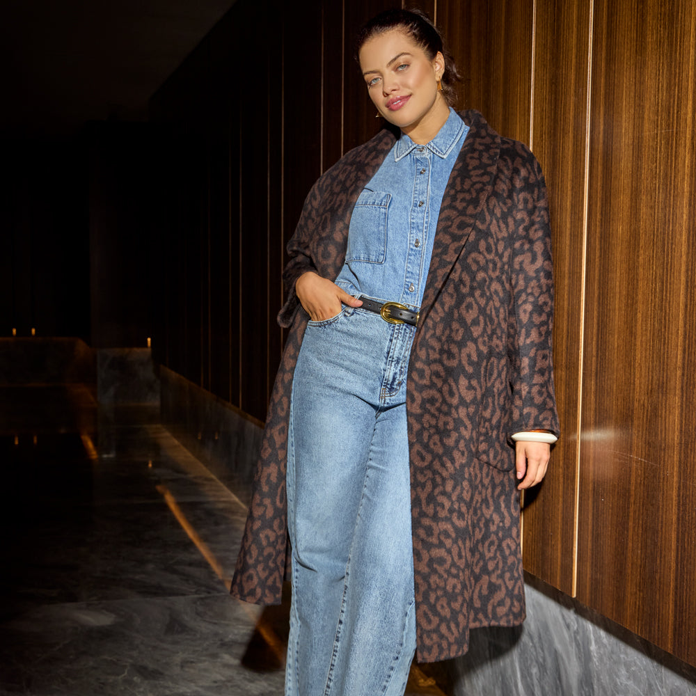 Model wearing the Leopard Jacquard coat with jeans shirt and pants.