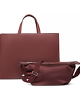 2-in-1 Tote Bag in Cherry Cola and detachable Mini Sling Bag on a white background.