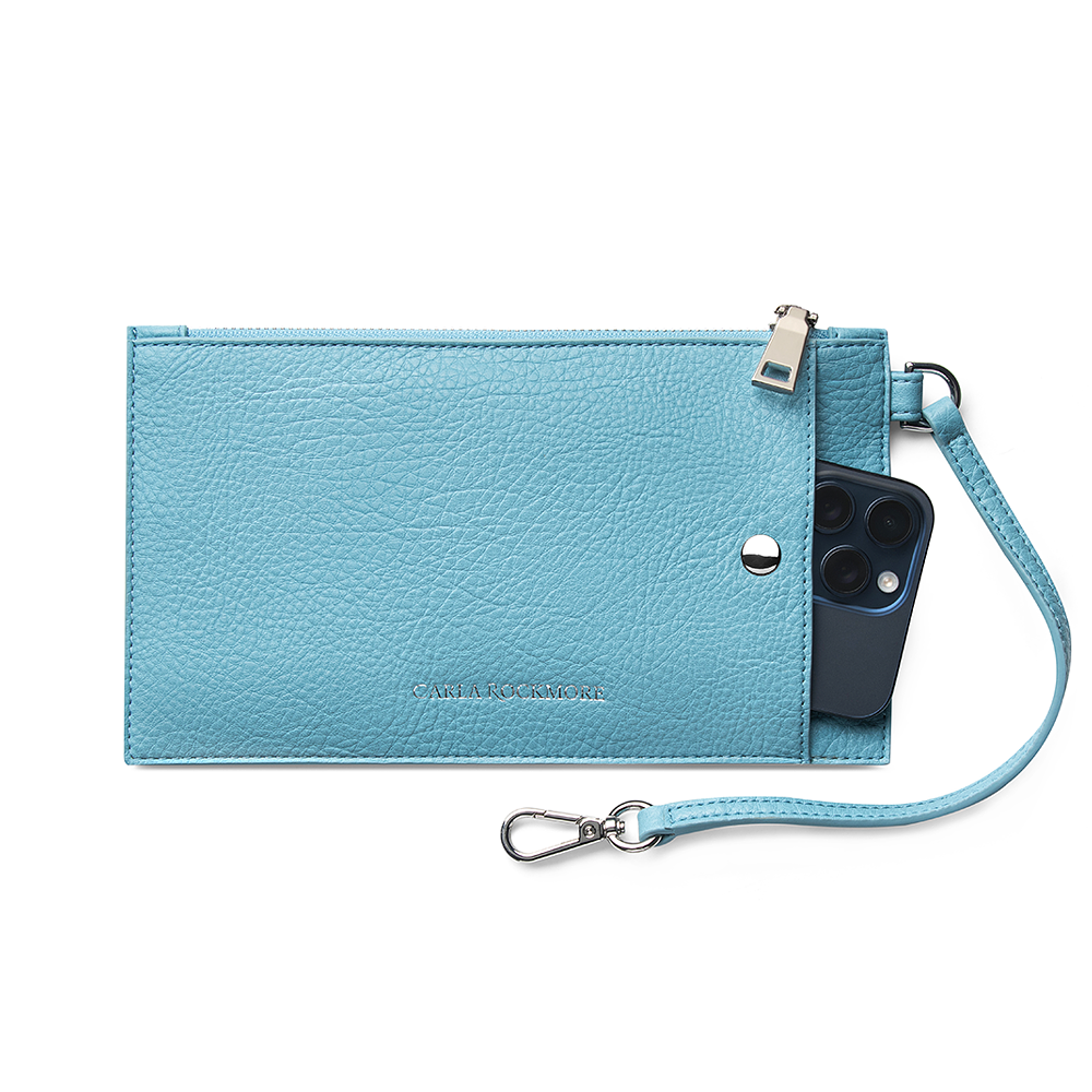 Close up of the Sling Bag 2.0 Detachable Wristlet in Sky Blue  on a white background.