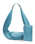 A sky blue sling bag with a textured surface, shown with an adjustable strap and a detachable wristlet pouch. The bag is zipped up on a white background.