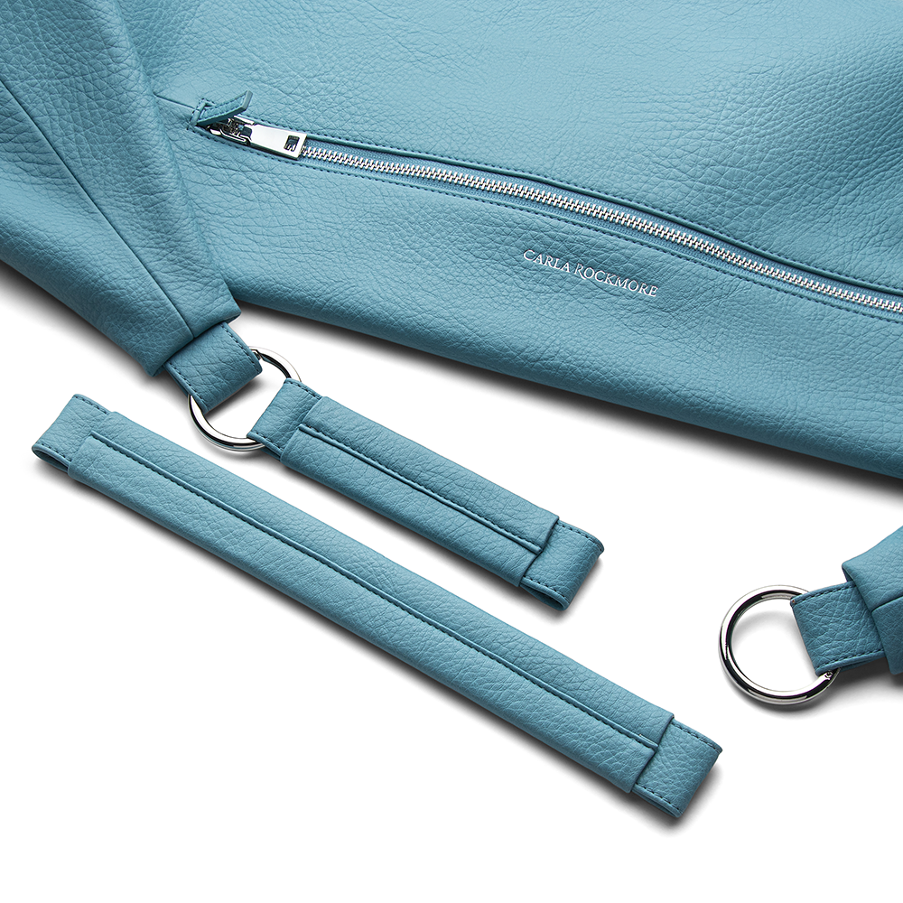 Close up of the Sling Bag 2.0 in Sky Blue Two Adjustable Strap in a white background.