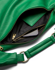 Emerald Green Sling Bag in vegan leather with open zipper showing black interior.