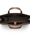 Walnut tote inside contains: laptop poket, zipper pockets for small items, twin open interior pockets to slide in your phone and other items. it has a holder for your water bottle.