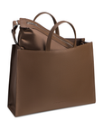 Walnut Tote with the matching detachable mini sling bag coming out of the bag.