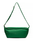 The emerald green mini sling bag with an adjustable strap and a zipper closure.