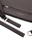 Detachable straps for the Sling Bag in Chocolate.