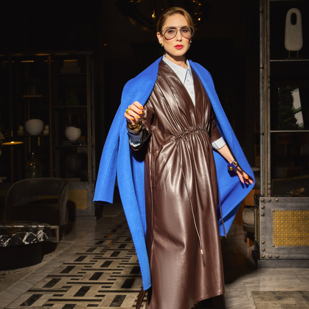 Carla modeling the coat in Cobalt with the everywhere everyday dress in Chocolate brown.