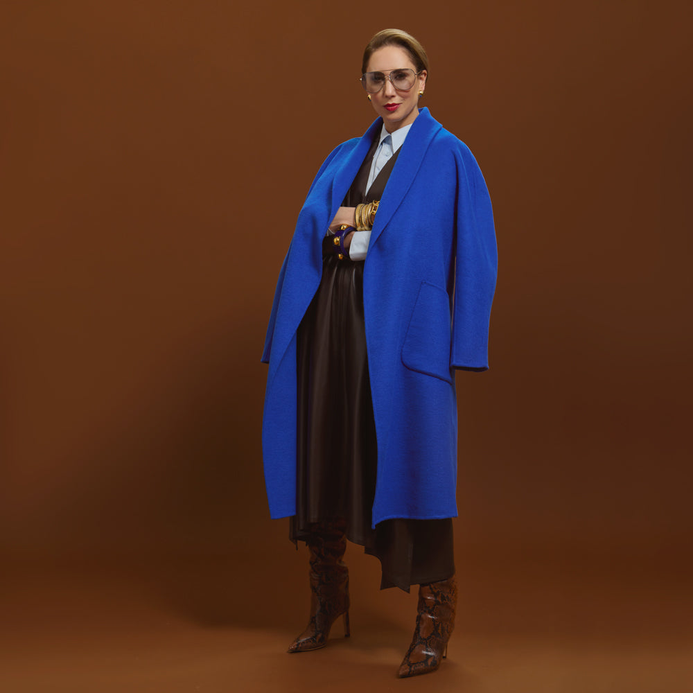 Carla wearing the Indispensable Car Coat Wool Blend in Cobalt  posing on the side. 