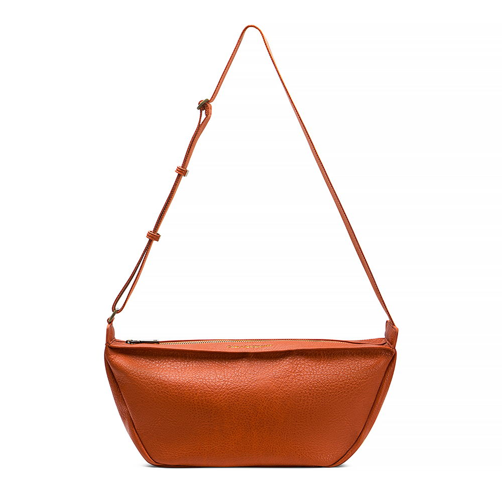 Mini Sling Bag in Burnt Sienna full body on a white background.
