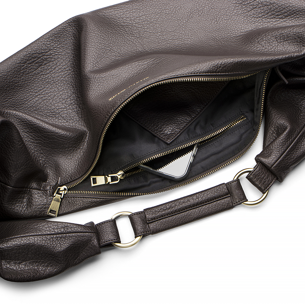 Sling Bag in Chocolate with a zipper on a white background.