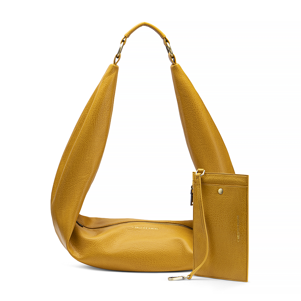Sling Bag 3.0 in Honeycomb with the detachable wristlet on a white background.