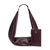 Merlot vegan leather Sling Bag with matching wristlet on a white background.