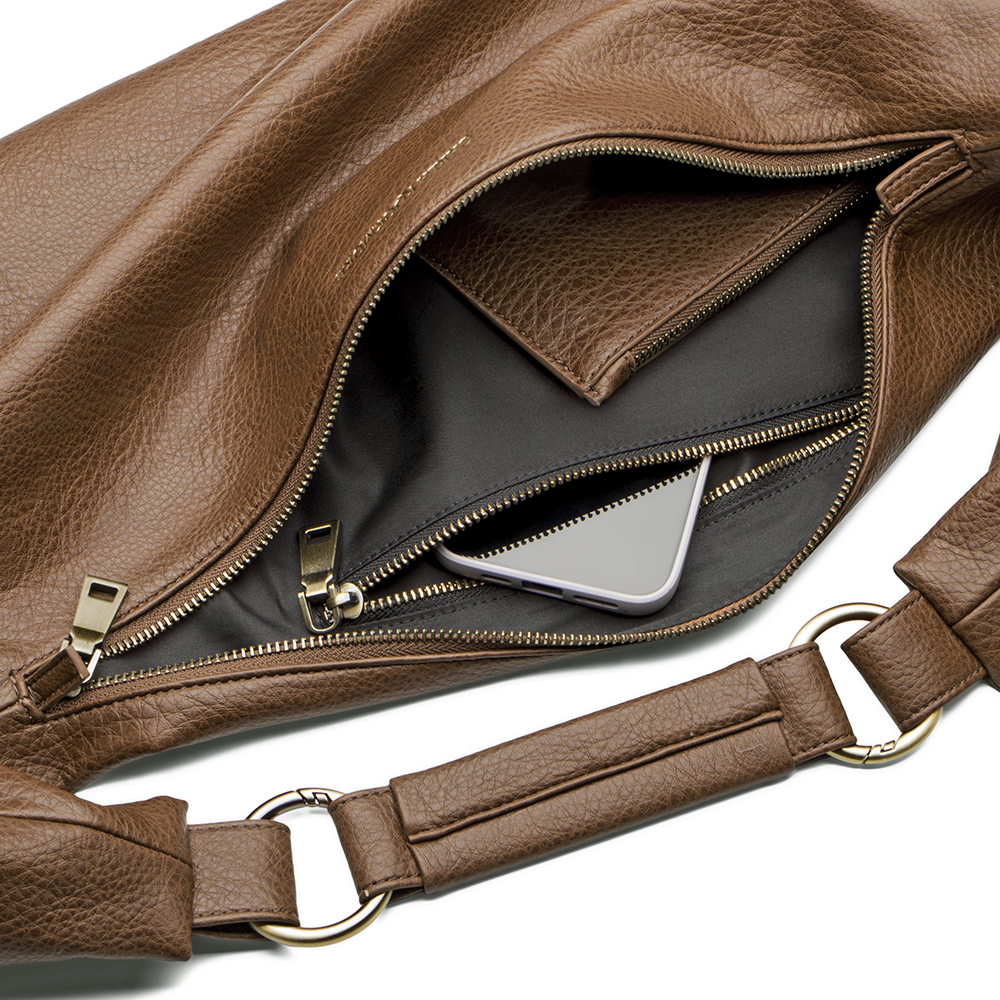 Sling Bag 3.0 in Saddle Inside Zipper Image. 