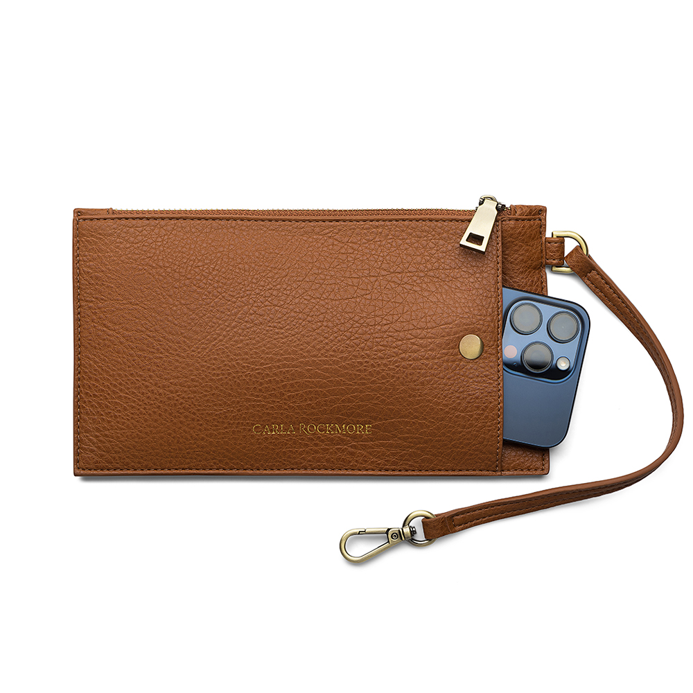 Sling Bag 3.0 in Saddle Wristlet in a white background.